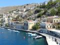 SYMI.